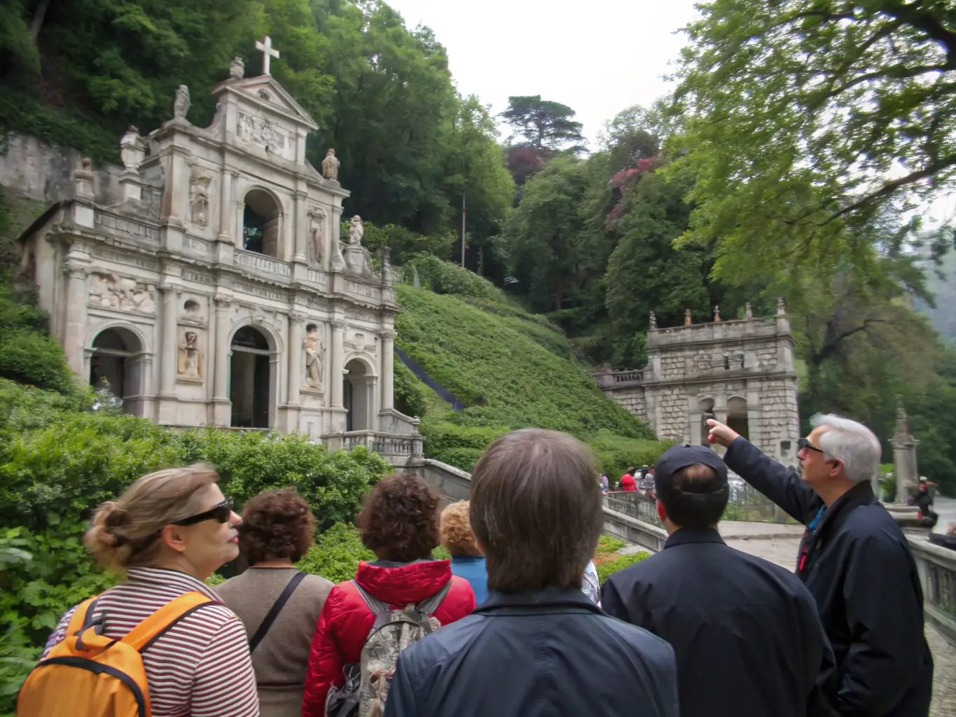 A captivating image of a guided tour through a historic site in the Cantal region, with a knowledgeable guide sharing insights and stories.